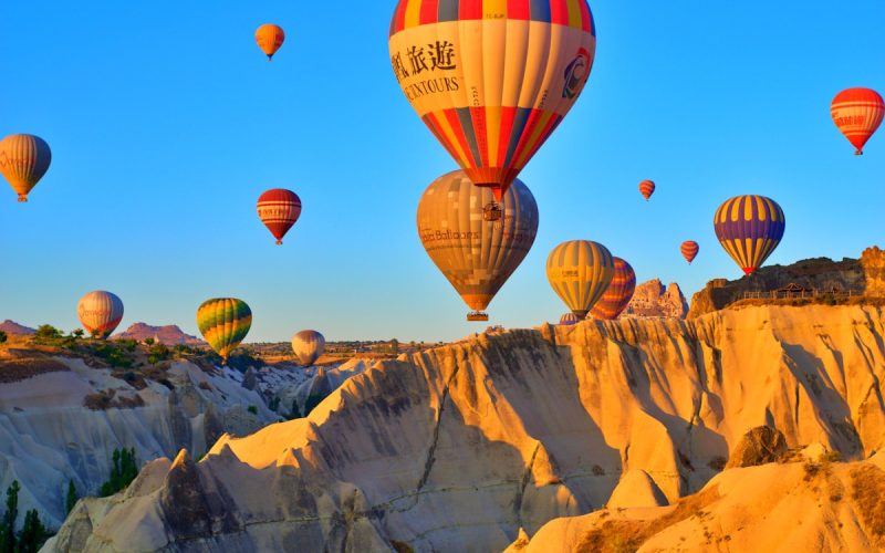 Hot air balloons over Cappadocia fairy chimneys