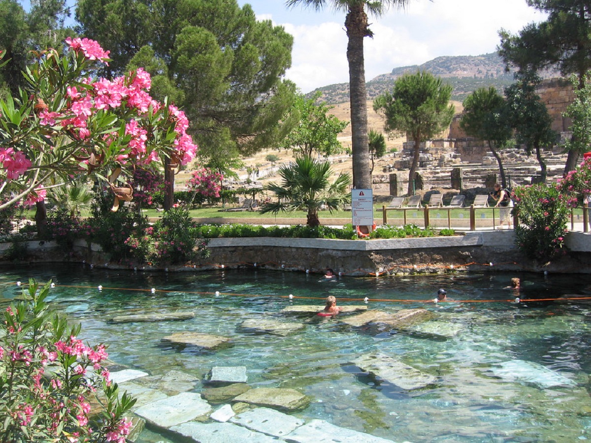 Cleopatra Antique Pool with Ancient Roman Columns Pamukkale Swimming in Cleopatra Antique Pool among ancient Roman columns Pamukkale Turkey