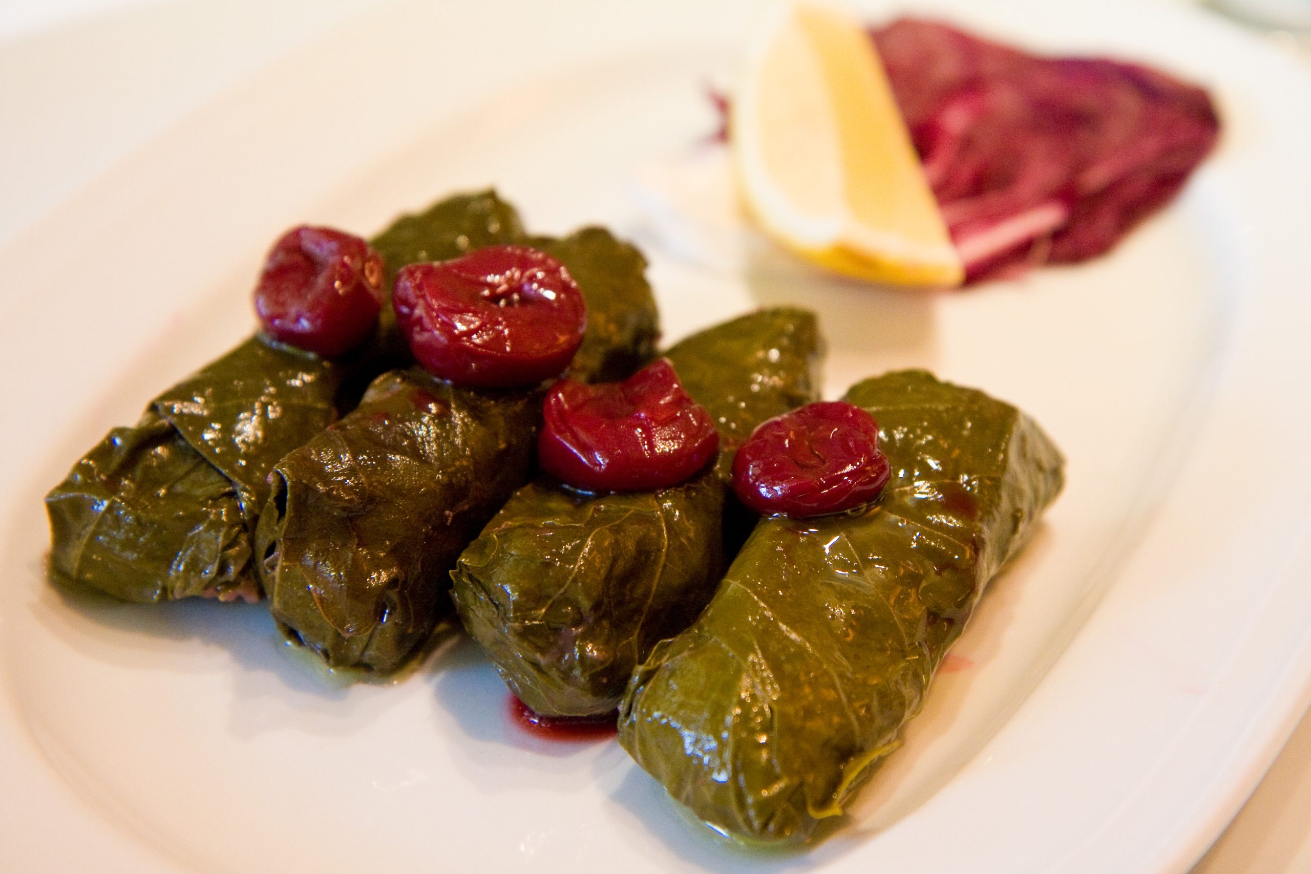 Turkish dolma and yaprak sarması stuffed grape leaves with rice, currants, and pine nuts