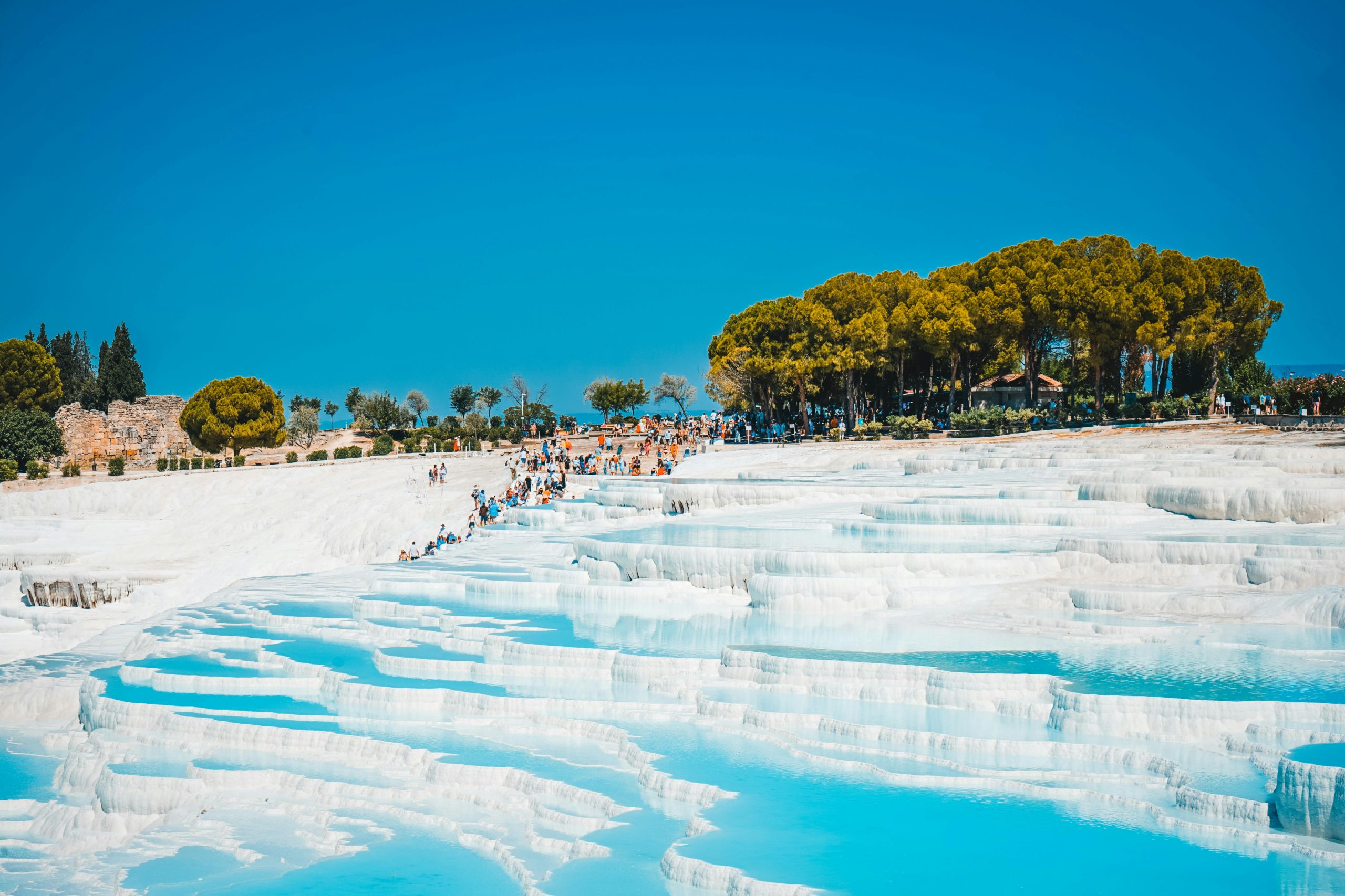 White travertine terraces of Pamukkale filled with turquoise thermal water