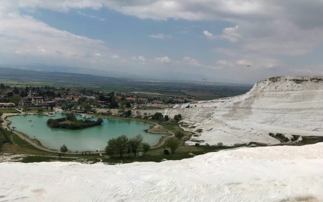 Pamukkale travertine terraces with turquoise thermal pools and white calcium formations, Turkey