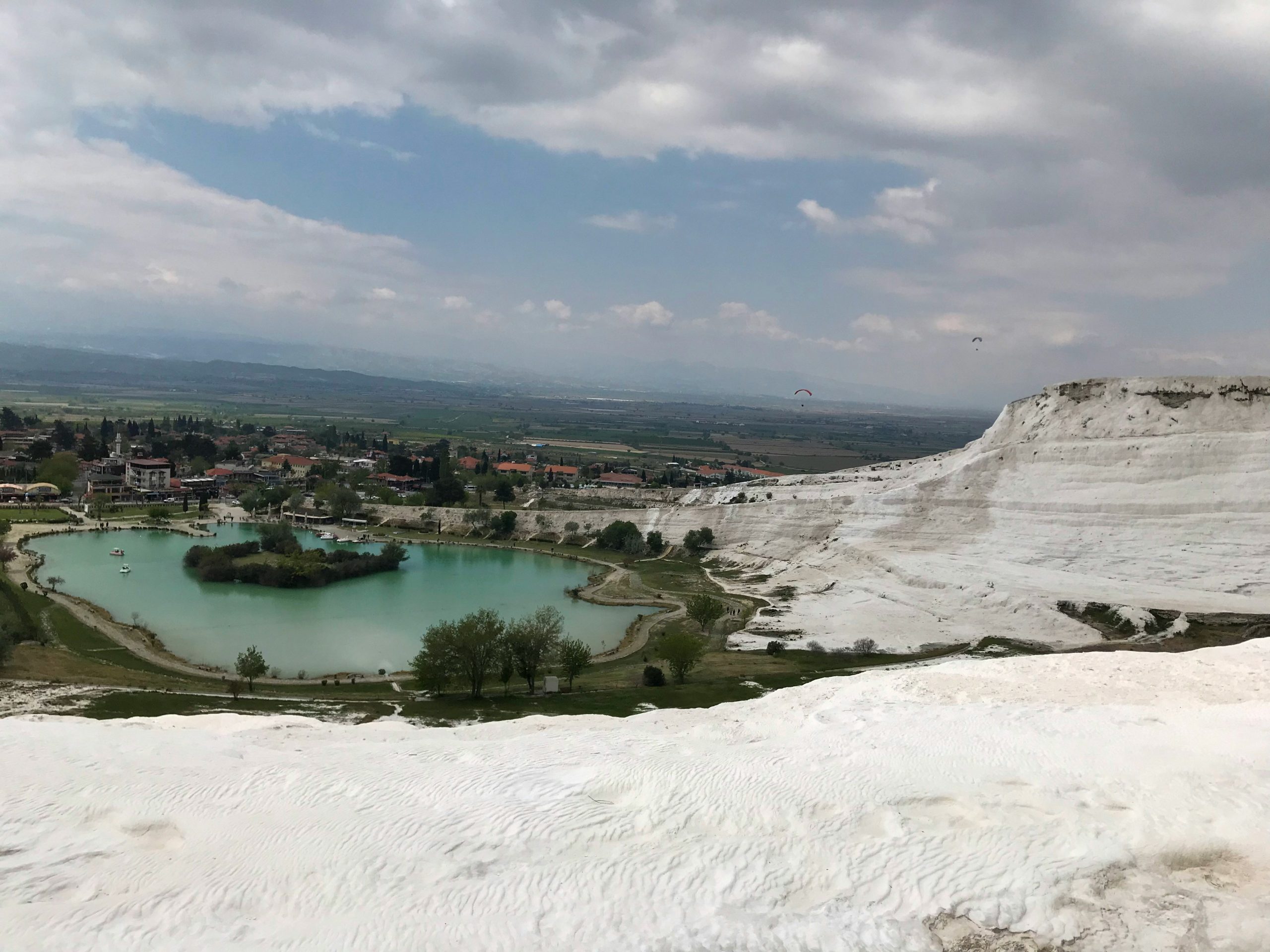 Pamukkale travertine terraces with turquoise thermal pools and white calcium formations, Turkey