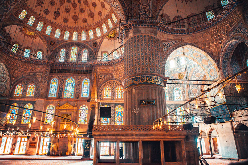 Blue Mosque interior in Istanbul with Iznik tiles and cascading domes