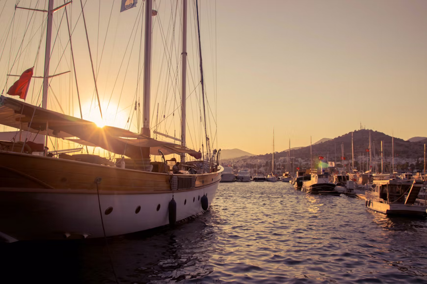 Bodrum gulets and boats at sunset, top boat things to do in Bodrum Turkey