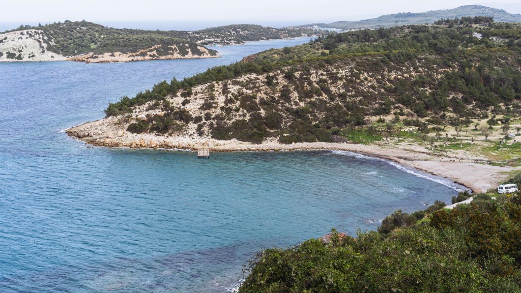 Azure waters and rocky beach in Dilek Peninsula National Park near Kusadasi Turkey
