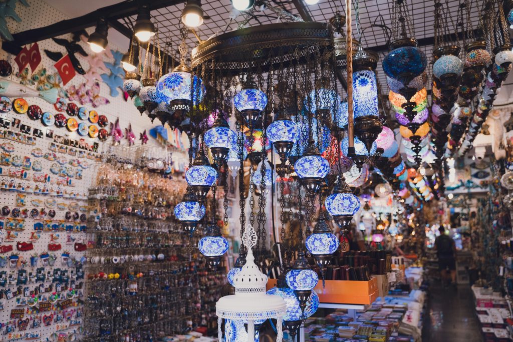 Grand Bazaar Istanbul interior with painted vaulted ceilings, hanging lamps and traditional shops