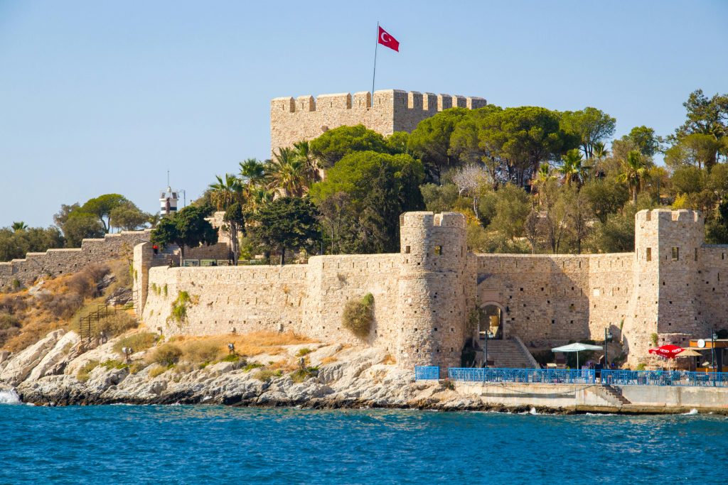 Stone walls of Kusadasi Castle on Pigeon Island with Aegean Sea view